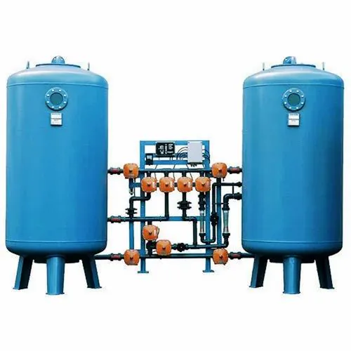 Duplex automatic industrial water softener with two blue pressure vessels and a valve manifold